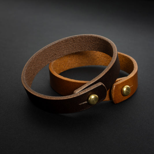 handmade leather wrist bands with solid brass sam browne studs - made from Buttero leather