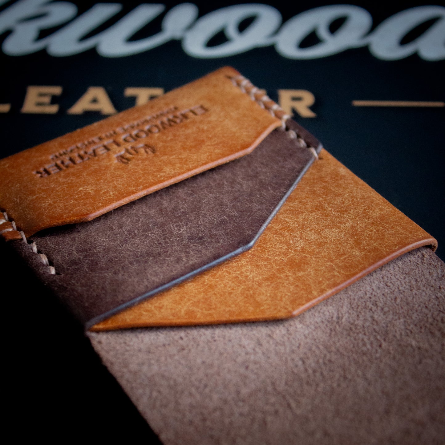 PDF TEMPLATE Elkwood Leather - The Blackthorn - EDC Flap full grain Italian Pueblo leather cardholder wallet open close up of pockets on wooden table next to brown leather baseball