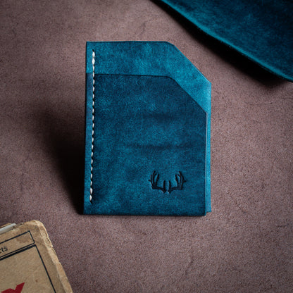 Folded handmade leather edc wallet with contrasting stitching made from Pueblo leather by Badalassi - Nationale