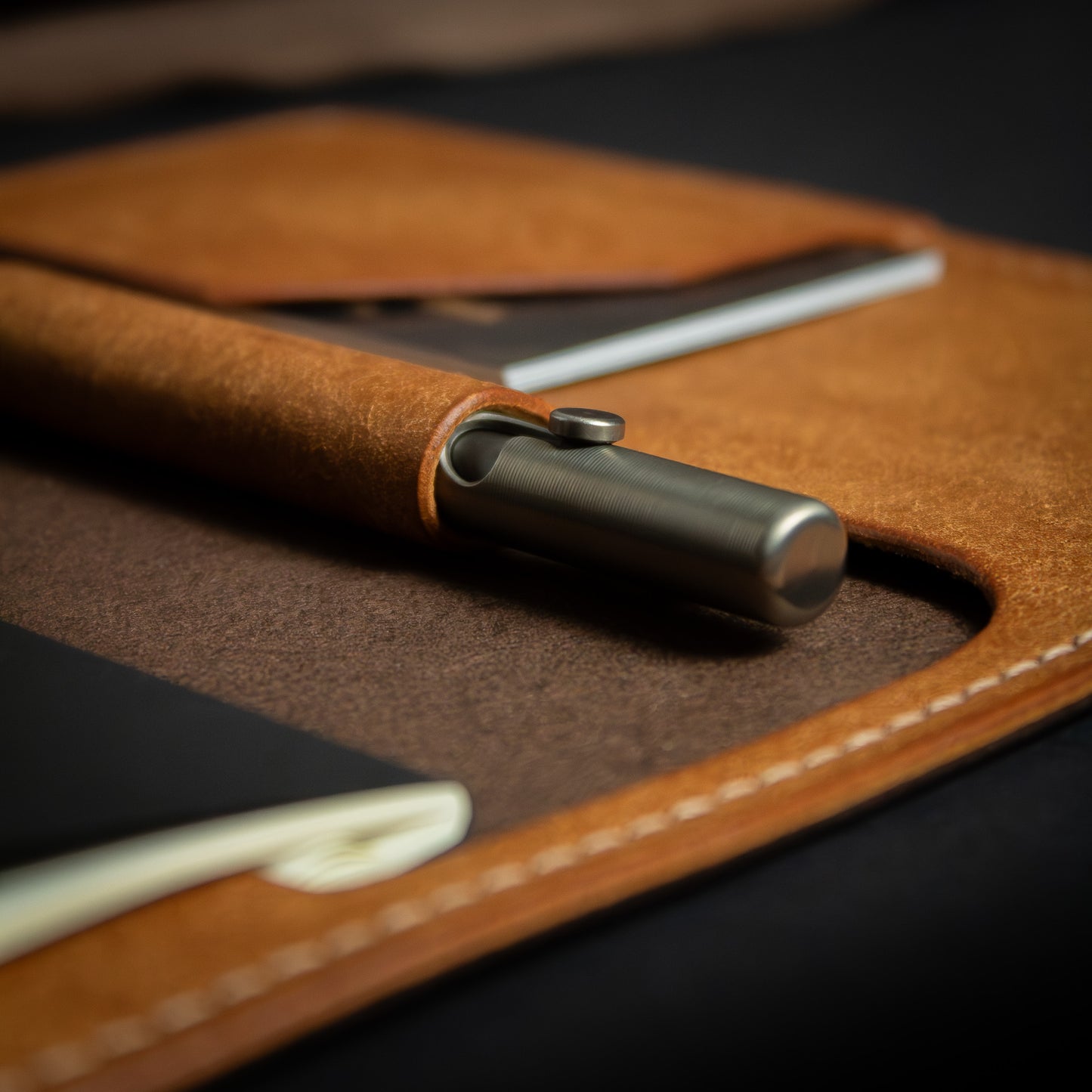 Handmade Leather Notebook Holder close up of leather pen loop. Leather Journal - Castagno & Cognac Peublo Leather