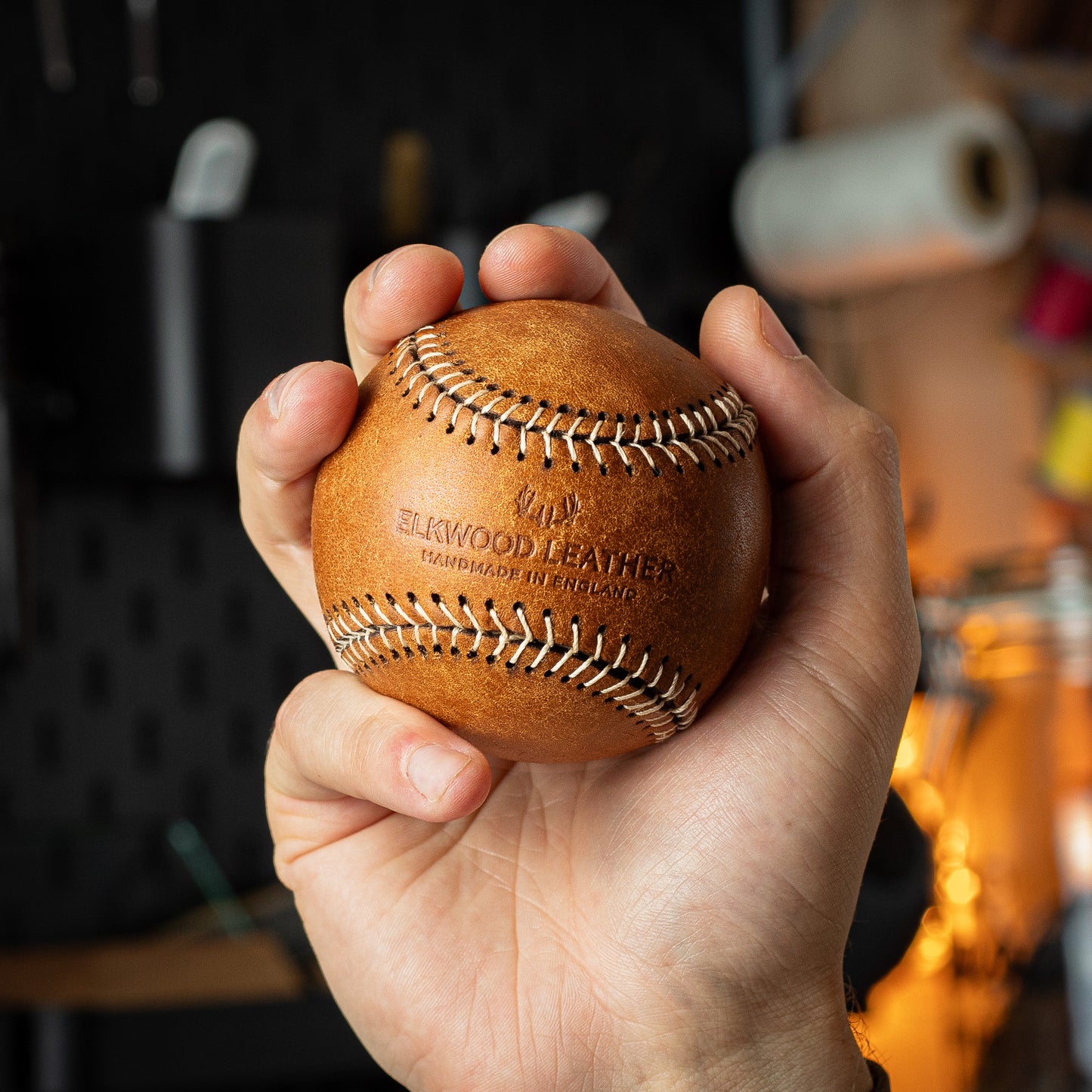 Handmade leather baseball made from brown cognac pueblo leather from badalassi Carlo