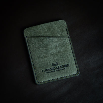 Minimalist cardholder with credit card in slot - Grigio Pueblo leather front side